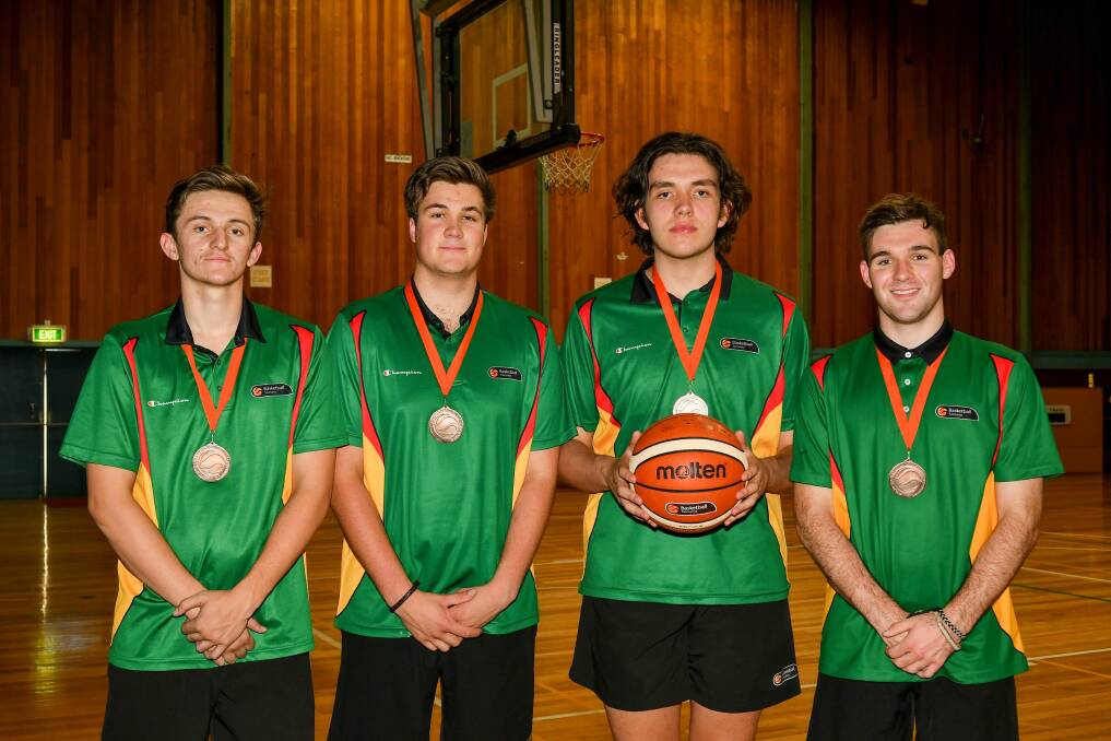 BRONZE BOYS: Northern state under-20 basketballers Jackson Lowe, Hayden Zasadny, Angus Kitson and Marshall Evans. Picture: Scott Gelston