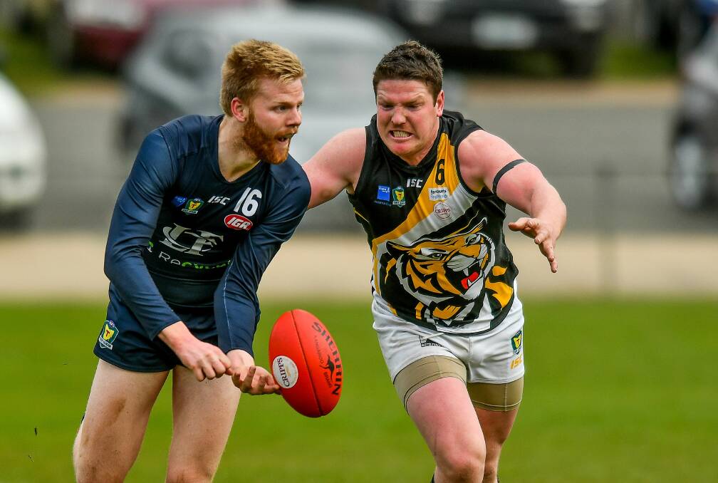 WEAPON: Michael Paul chases down Simon Vandervelde last season. Both players are playing SFL this year. 