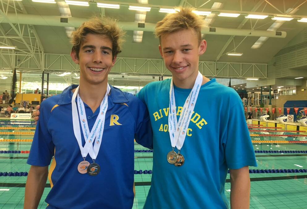 MEDAL MAGNET: Launceston teenager Ethan Stretton with Riverside Aquatic teammate Kiaran Gillies. Picture: Wendy Shaw 
