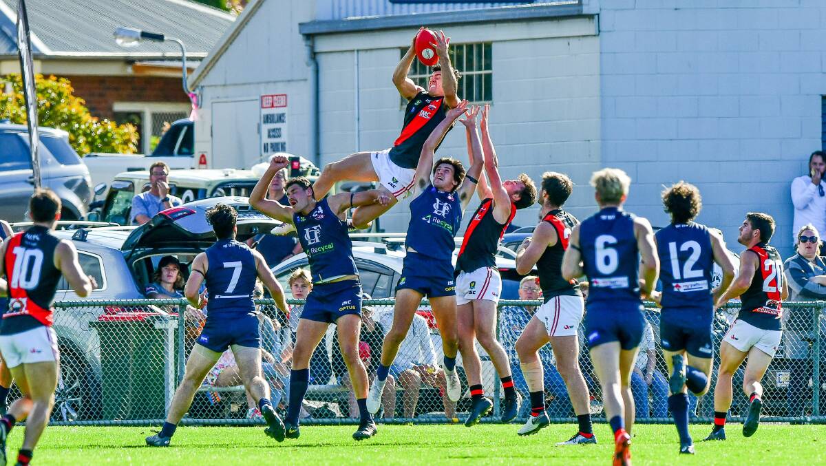TAKE-OFF: Arion Richter-Salter takes mark of the year against Launceston on Good Friday. Picture: Scott Gelston
