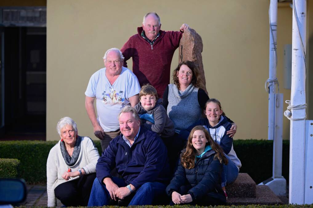 GENEROSITY: Jesse Ansell (centre) with dad Simon and mum Dianne Thomas, sisters Rachel and Abigail, Aran Miller's mum Nada (left), and Exeter Services and Community Club's treasurer Kerry Quinn and president Lloyd Rogers. Picture: Phillip Biggs