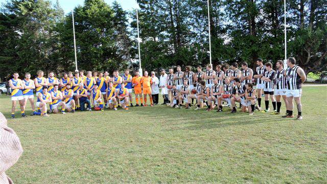 SIXTY YEARS IN THE MAKING: East Coast Swans and Winnaleah line up before the historic match on Saturday. Picture: Supplied