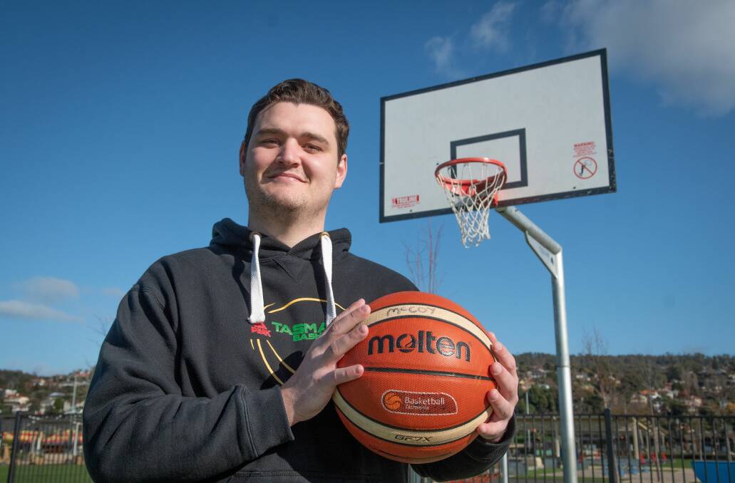 BALL IN HAND: Basketball Tasmania's Northern development officer Brad Kann. Picture: Paul Scambler 