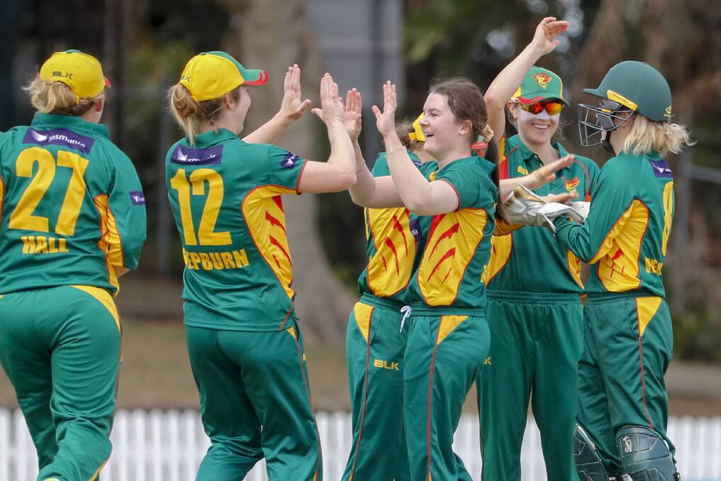 HERE WE GO: All-rounder Courtney Webb celebrates a wicket with skipper Brooke Hepburn in Tasmania's first WNCL win in two years. Picture: AAP