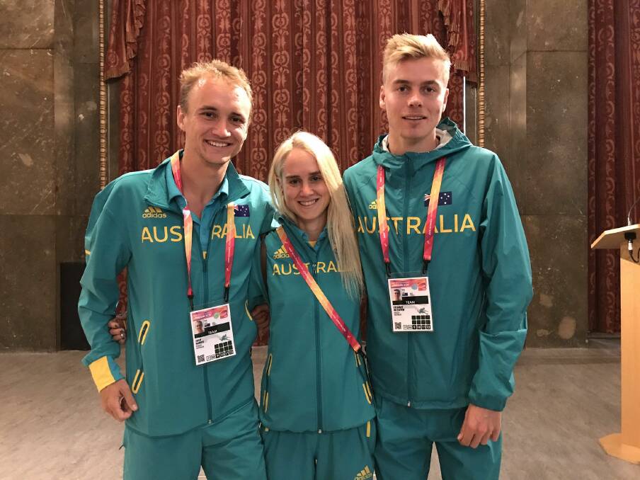 STATE OF ORIGIN: Clark with fellow Tasmanian athletes Josh Harris and Stewart McSweyn at the 2017 London world championships. 