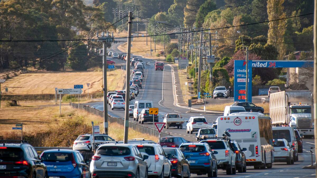 Banked-up traffic leaves no gaps for motorists to enter the highway from Bridgenorth Road. 
