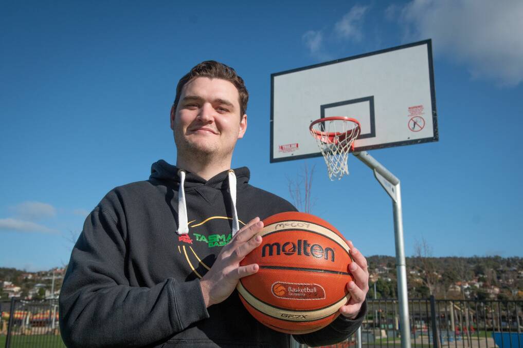 BALL IN HAND: Basketball Tasmania's Northern development officer Brad Kann. Pictures: Paul Scambler 