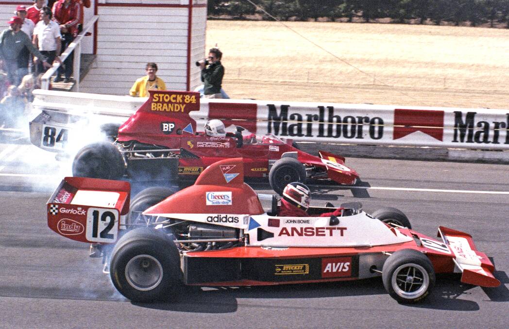 HISTORY MAKER: John Bowe in the Elfin MR8 with Alfredo Costanzo on pole in the Lola T430 at Symmons Plains in 1980. Picture: Bruce Thomas