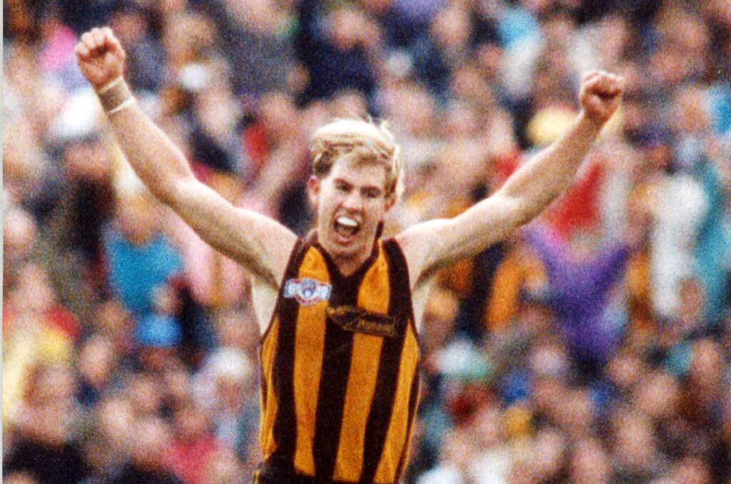 HANDS UP: Paul Hudson celebrates a goal in the 1991 AFL Grand Final. Picture: The Age