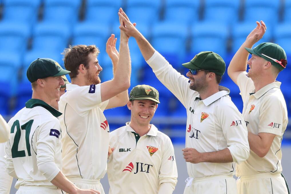 Pyecroft celebrates a wicket with former Scotch Oakburn student and Test No.3 Alex Doolan. Picture: AAP