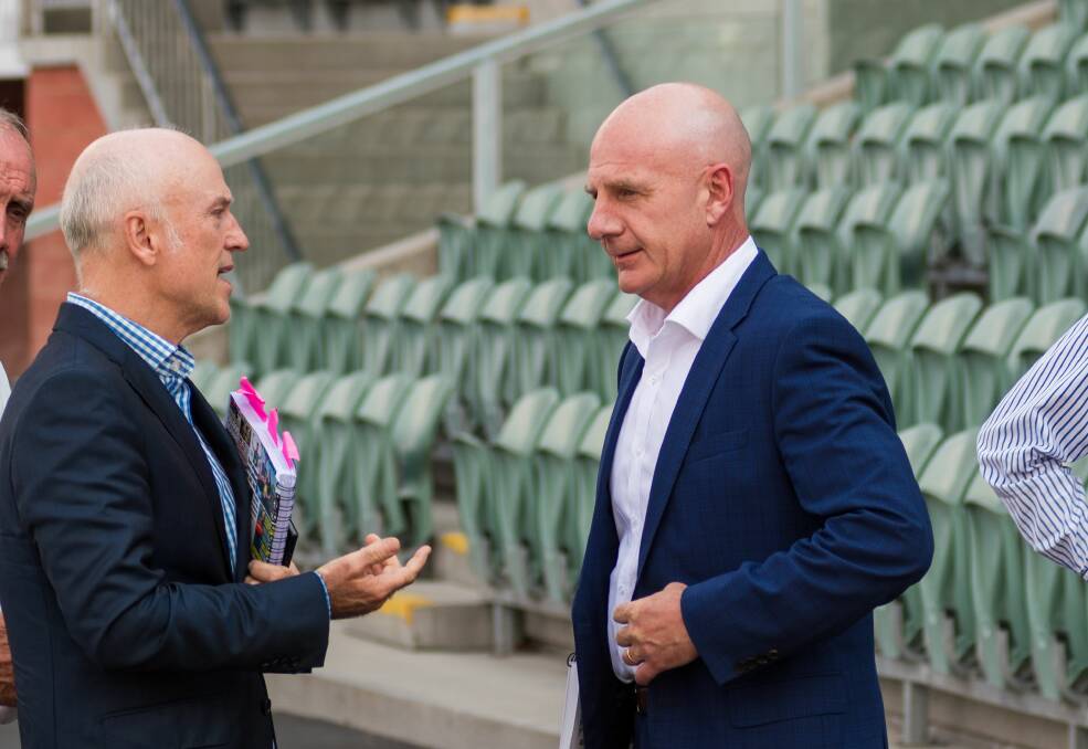 MAKING A CASE: Premier Peter Gutwein (right) in conversation with Tasmania AFL taskforce chairman Brett Godfrey. Picture: Paul Scambler