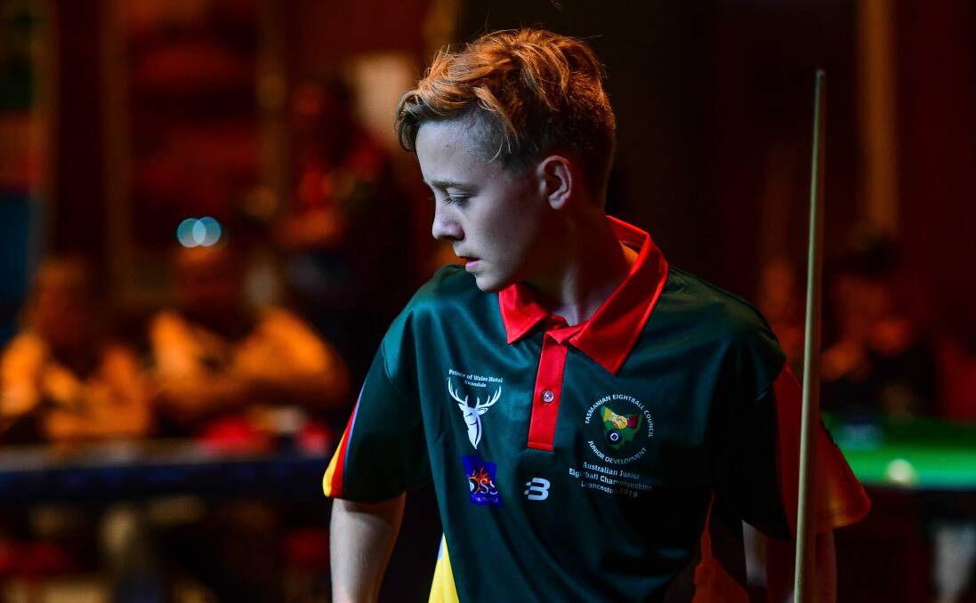 Under-15 Blake Rawlings assesses his next move against Nothern Territory opponent Liam Taylor.
