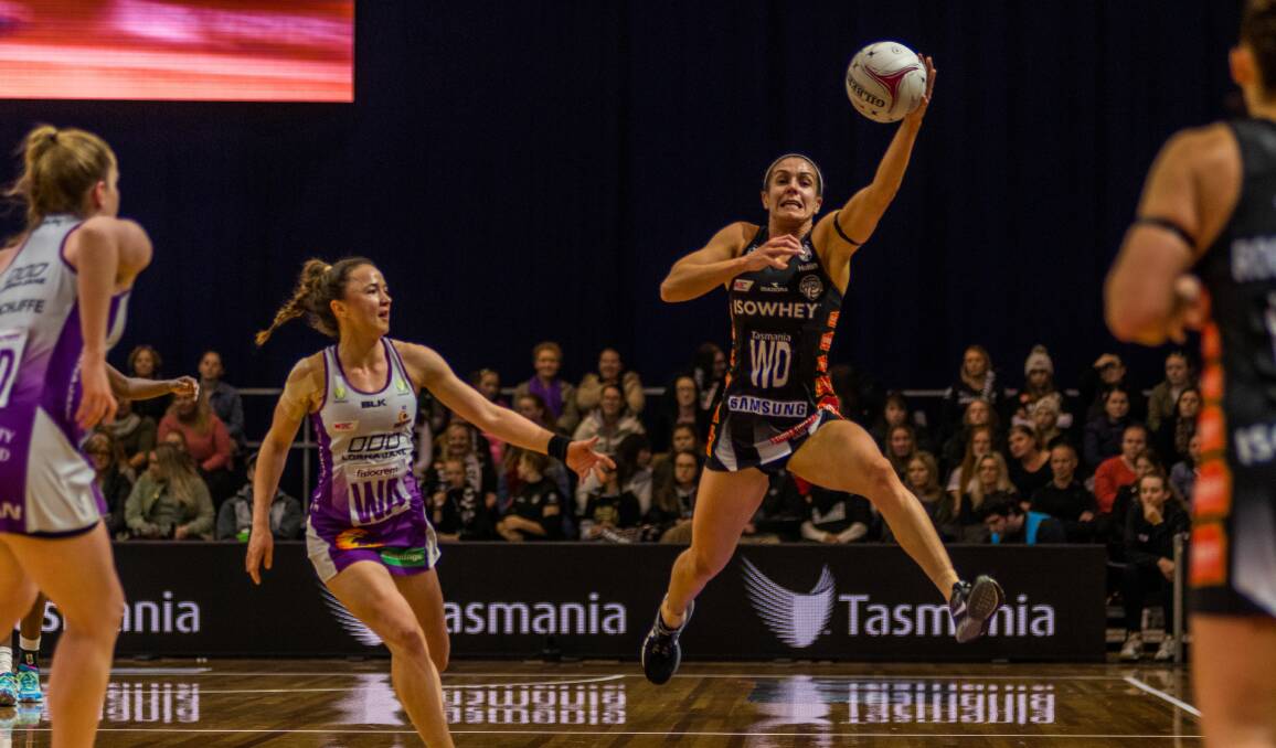 FLYING PIE: Collingwood wing defence Ash Brazill takes the ball against the Queensland Firebirds at the Silverdome earlier this year. Picture: Phillip Biggs 
