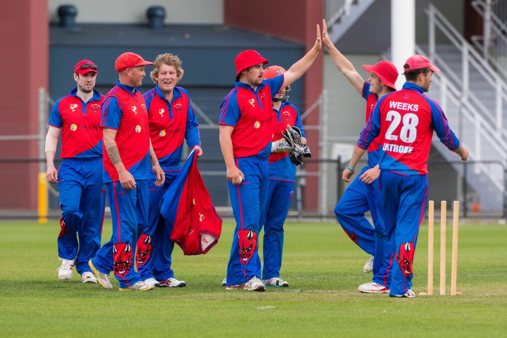 EIFFEL TOWER: Latrobe players celebrate a Mowbray wicket en route to an eight-wicket victory at Invermay Park. Picture: Phillip Biggs
