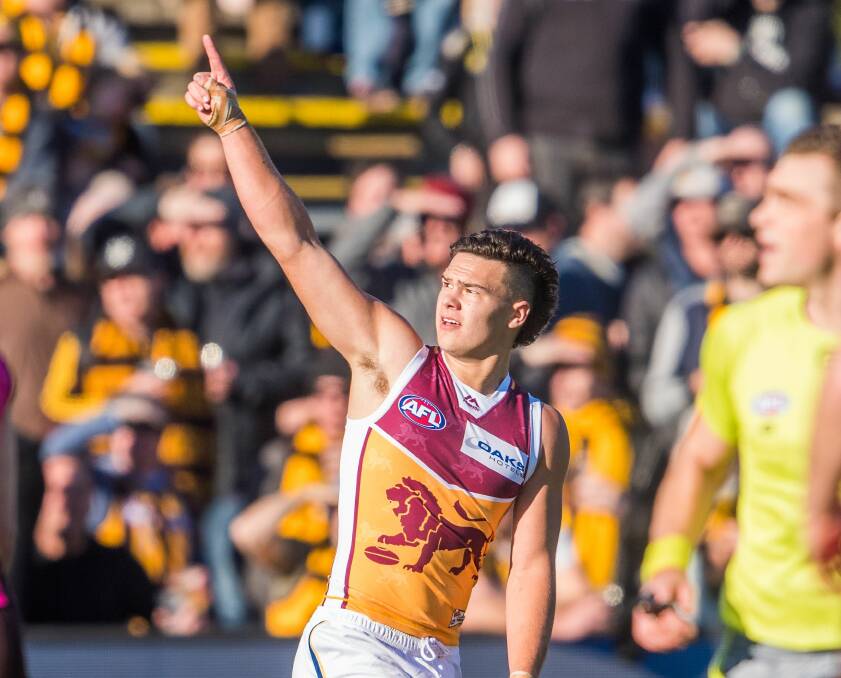 SALUTE: Former number one draft pick Cam Rayner kicked three goals in the Lions' 33-point win at UTAS Stadium last year. Pictures: Phillip Biggs 