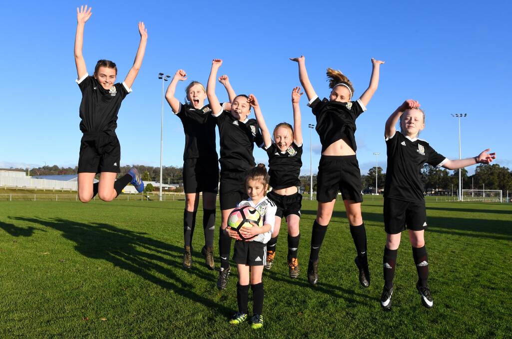 THE CUP IS COMING: Launceston City juniors react to Australia's successful World Cup bid. Pictures: Neil Richardson