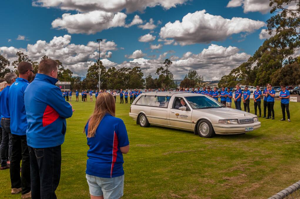 RESPECT: A guard of honour pays tribute to Terry Coghlan at Youngtown Oval on Wednesday. Pictures: Phillip Biggs
