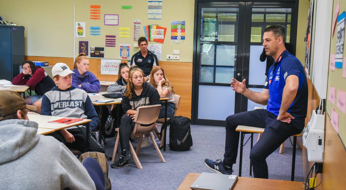 ROO LESSON: North Melbourne assistant coach Jade Rawlings talks to Newstead college athlete development students earlier this week. Picture: Paul Scambler