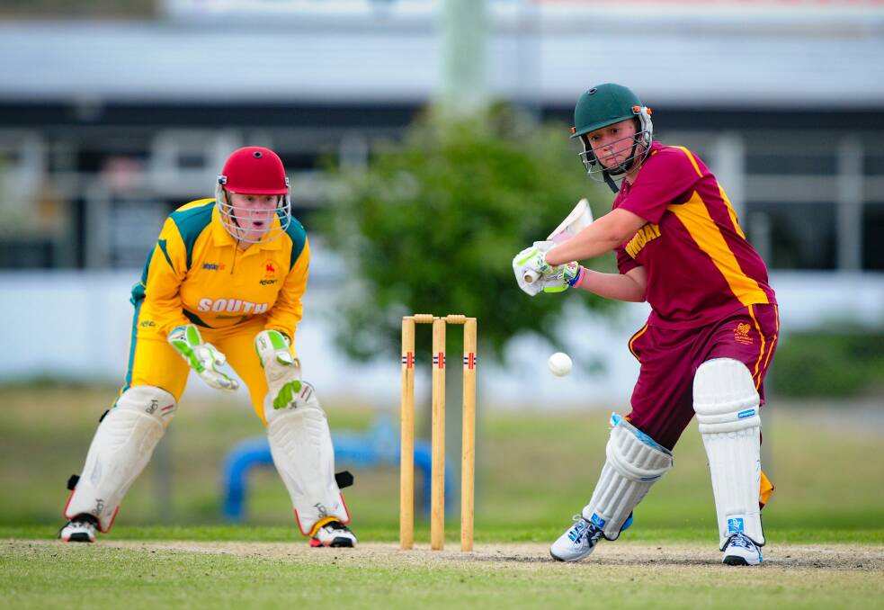 WHACK: South Launceston keeper Caitlyn Webster and Eagles all-rounder Cassie Blair. 