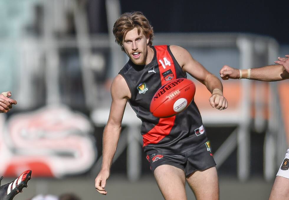 TOUGH BREAK: Northern Bombers midfielder Dan Withers looks set to miss some football after being stretchered off with an ankle injury. 