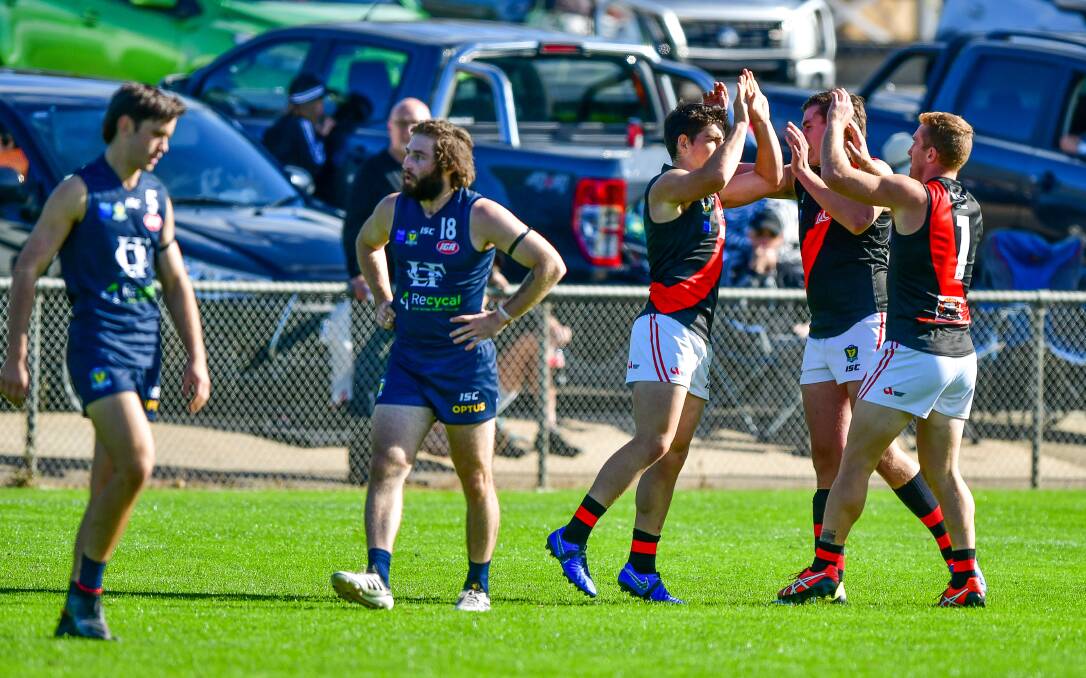 HGH FIVES: North Launceston players celebrate a goal in last year's derby win over Launceston. The two sides were set to meet in round two before the season was postponed due to the coronavirus pandemic.