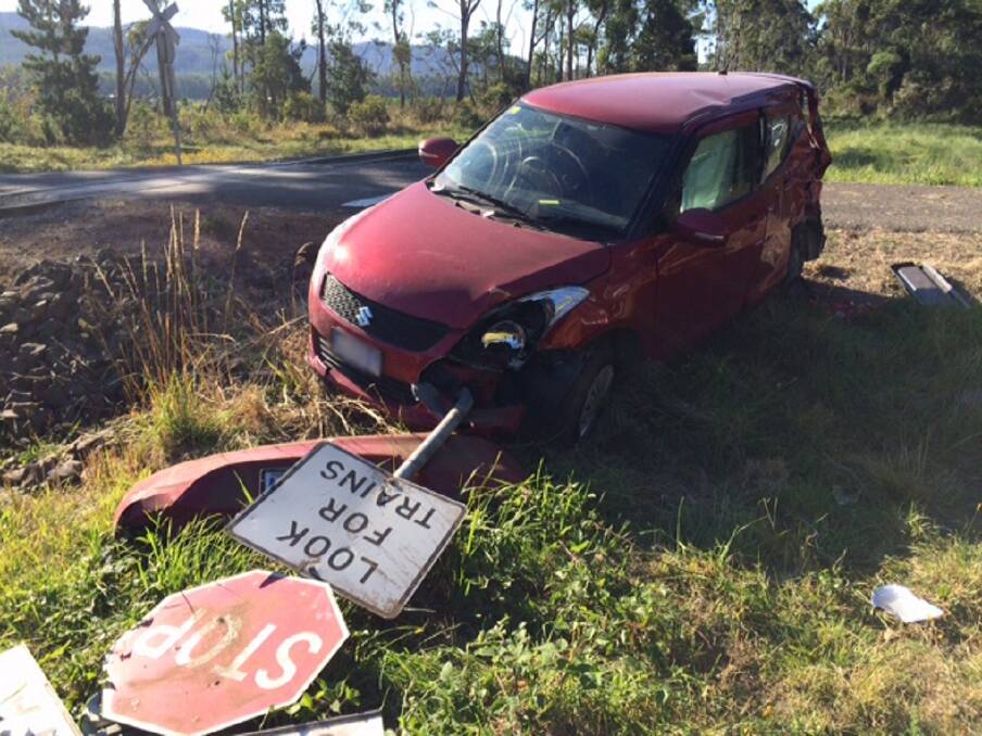 LUCKY TO BE ALIVE: The driver of a red Suzuki Swift walked away uninjured from a collision with a train west of Railton on Thursday night. Picture: Supplied 