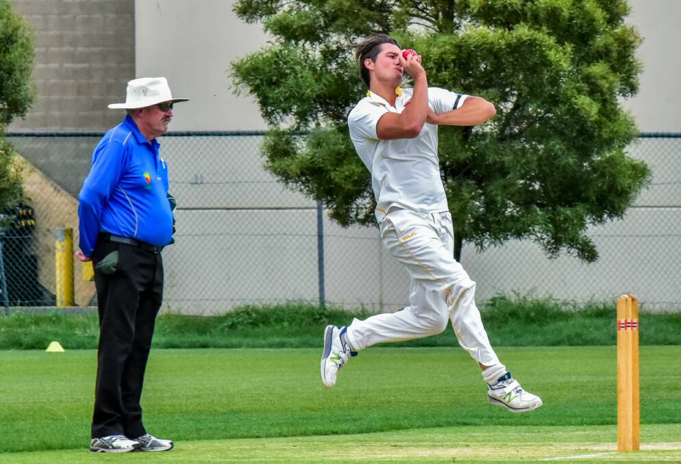 TEARING IN: South Launceston paceman Jackson Young took 1-26 off 10 overs in Riverside's second innings. Picture: Neil Richardson 