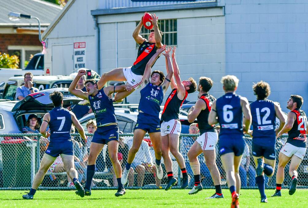 UP THERE: Arion Richter-Salter takes a mark of the year contender en-route to winning the Adam Sanders medal. Picture: Scott Gelston