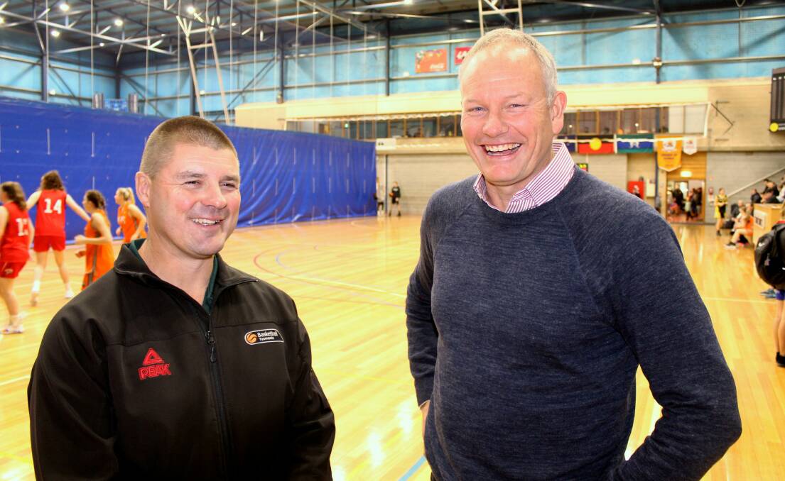STATE BID: Basketball Tasmania chief executive Chris McCoy with Basketball Australia chairman Ned Coten at Elphin Sports Centre. Picture: Hamish Geale