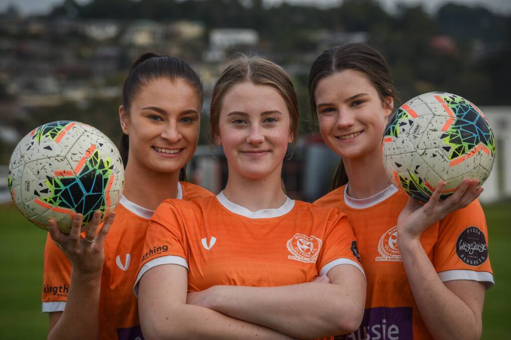 WINGING IT: Riverside Olympic soccer sisters Georgia, 19, Amelia, 13, and Chelsea Wing, 16. Picture: Paul Scambler
