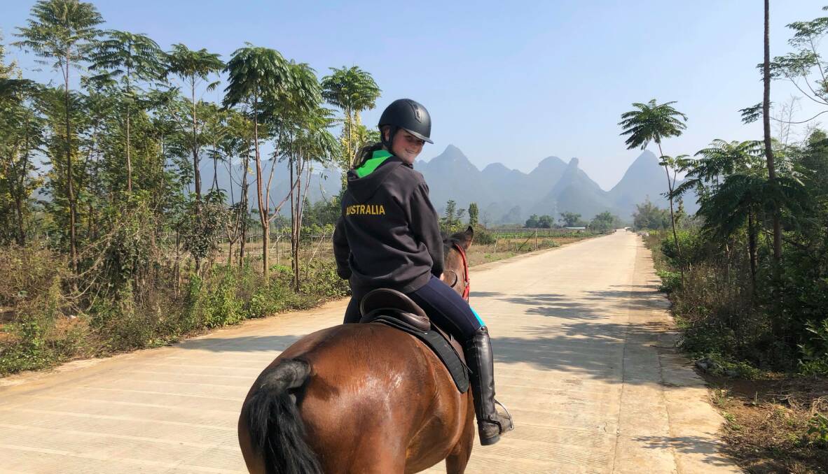 ORIENTAL EXPRESS: Relbia's Alexandra Mulcaster rides a trail in Guilin, China. Picture: Supplied