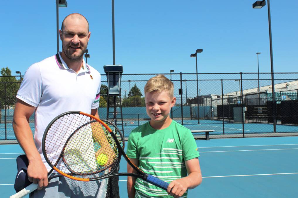 NEXT TRAM TO MELBOURNE PARK: West Launceston 10-year-old Doug Sheppard, coached by James Bolzonello (left), is off to the Super 10s at the Australian Open. Pictures: Hamish Geale 
