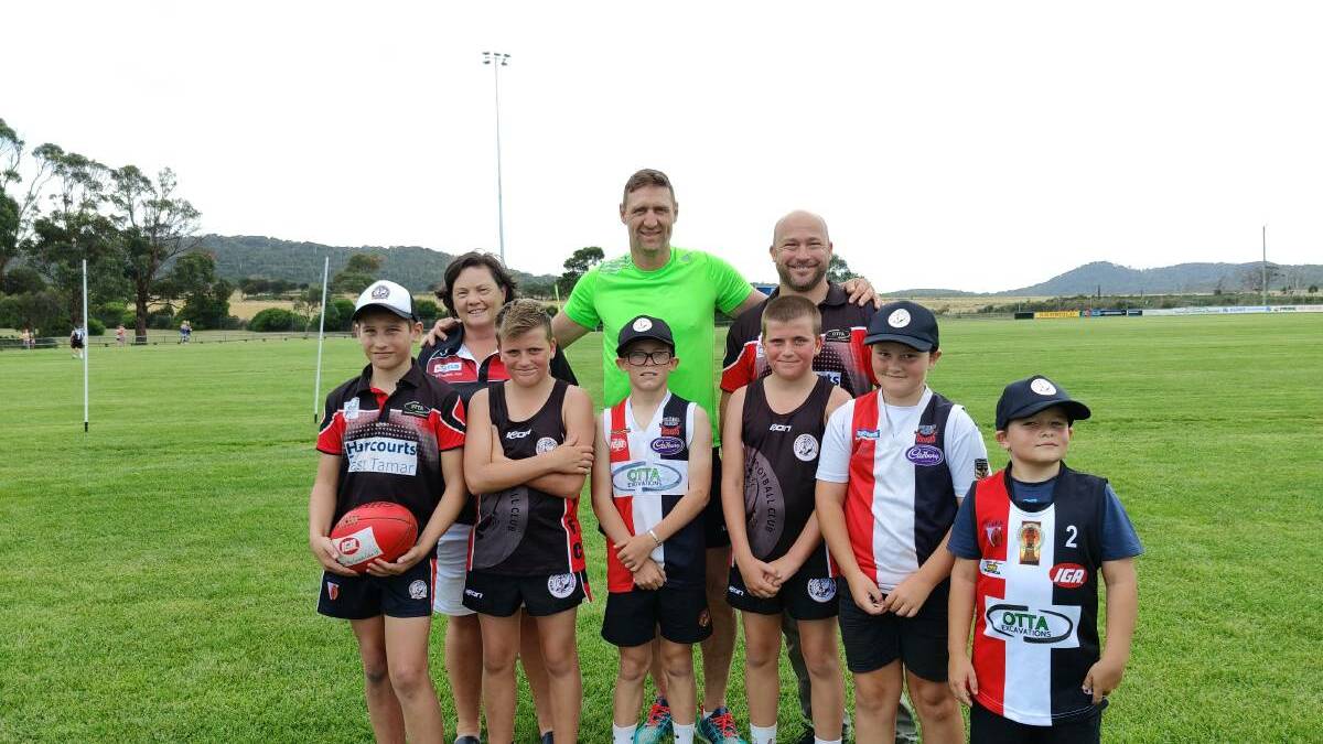 Jay Schulz catches up with George Town juniors earlier this year. 