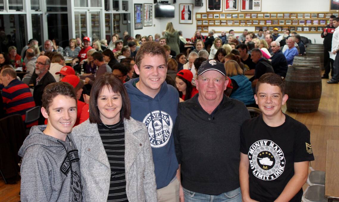 SHOW OF SUPPORT: George Town cricketing talent Jarrod Freeman with older brother Nathan, mum Tracy, dad Steve and younger brother Sam. About 150 turned out for a trivia night on Saturday to help the up-and-comer make the trip to England.
