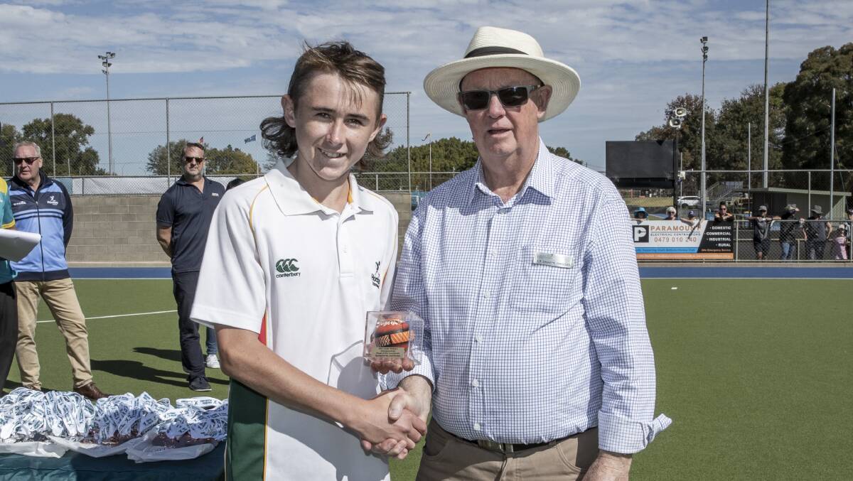 GUN: Tassie under-15 captain Oliver Stebbings receives the player of the tournament award. Picture: Click InFocus