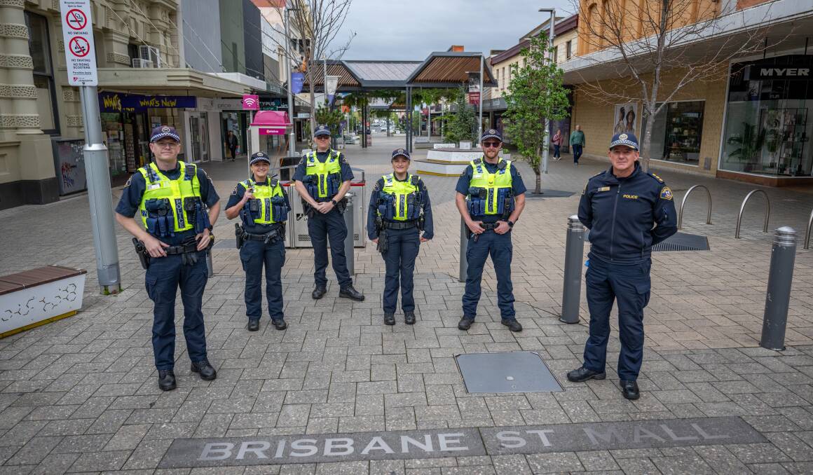 Constables Hamish Fife, Olivia Walker, Jarrod Ison, Paige Kroon and Senior Constable Adam Upston with Inspector Craig Fox in Brisbane Street Mall. Picture by Paul Scambler 