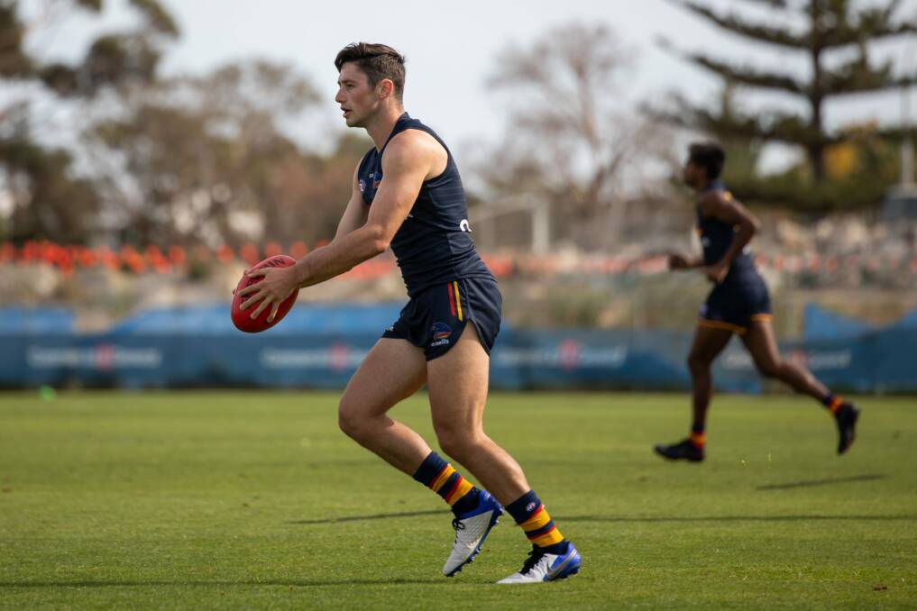 BACK IN THE FOLD: Adelaide's ex-Launceston star Chayce Jones winds up at training. Picture: Adelaide Football Club/ Kieron Turner 