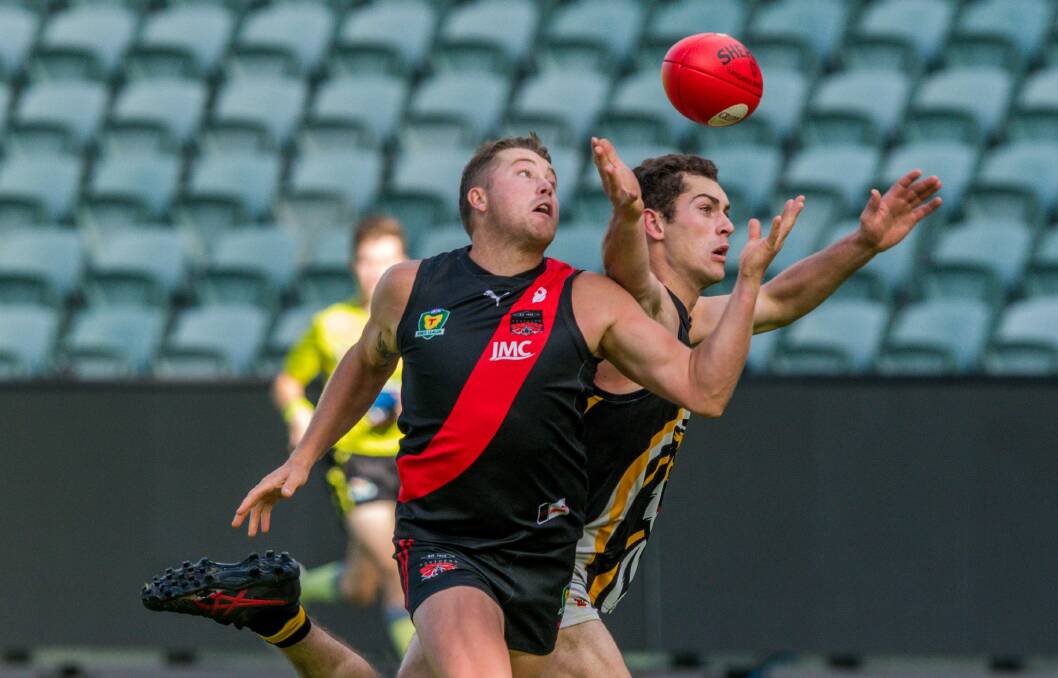 ZACH ATTACK: Northern Bombers forward Zach Burt keeps his eye on the ball. Picture: Phillip Biggs
