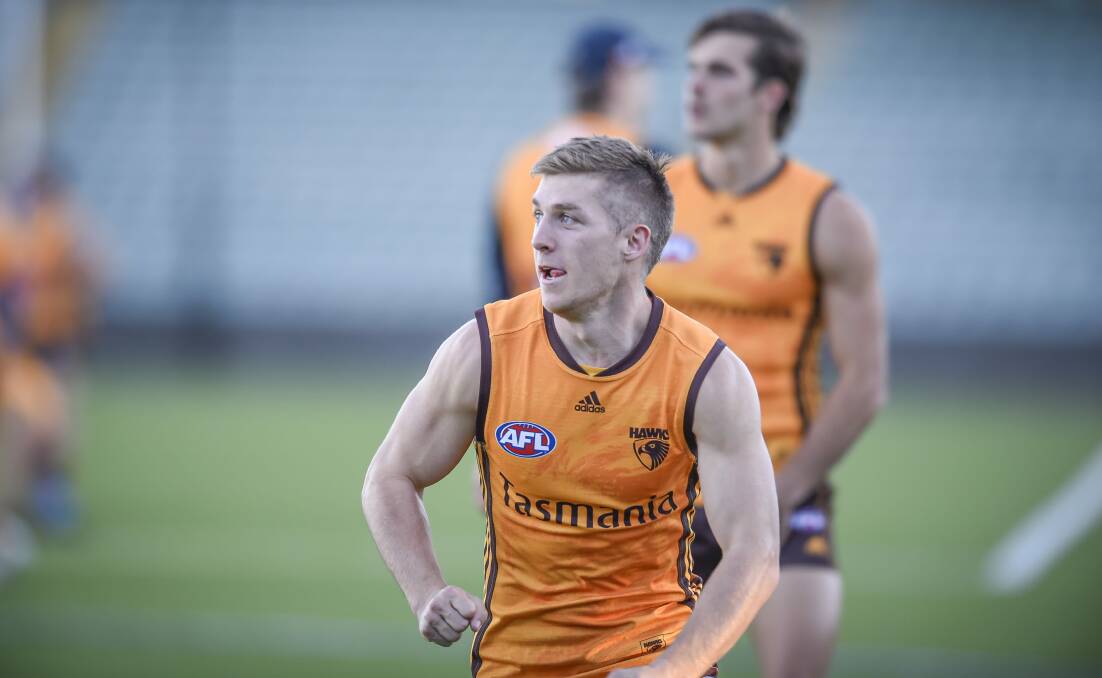 MOORE LIKE IT: Forward Dylan Moore leads for the footy at Hawthorn training on Saturday. Picture: Craig George