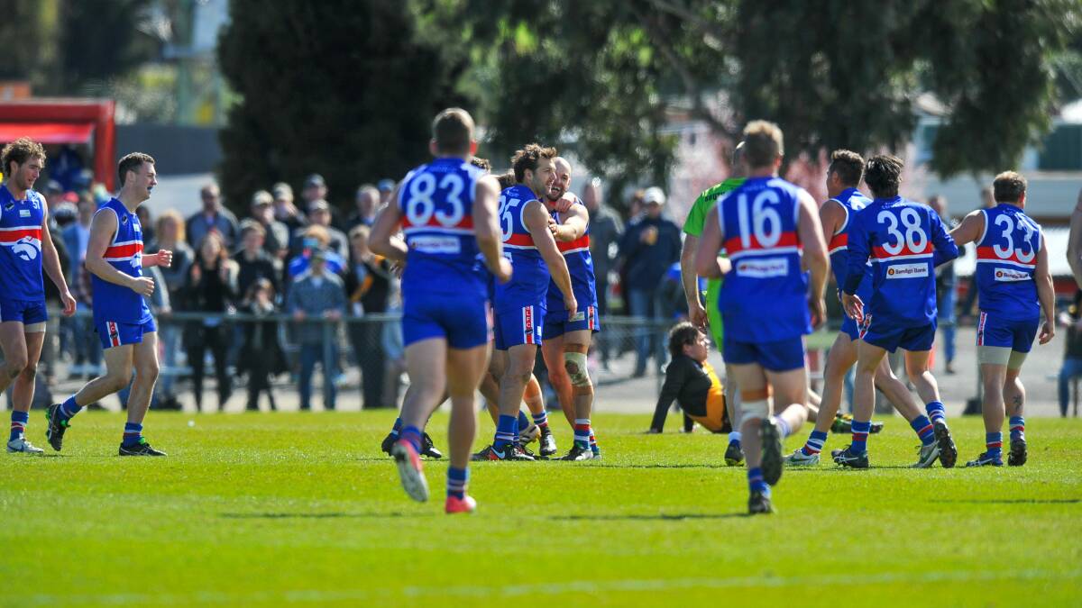 WHEN YOU'RE WINNING: South Launceston reserves celebrate their third premiership on the trot after defeating Longford by two points. Pictures: Scott Gelston