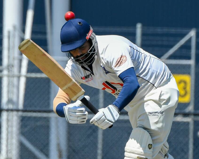 HEAD IN THE GAME: Riverside all-rounder Ramesh Sundra cops one on the helmet en route to 37 not out. Pictures: Neil Richardson 