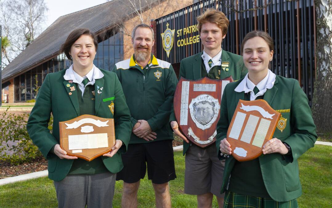 ELEVENTH HEAVEN: St Patrick's College cross country co-ordinator David Rae with cross country captains Erin Giles and Laurie Dean and under-20s second-place finisher Annabelle Sanders. Picture: Supplied