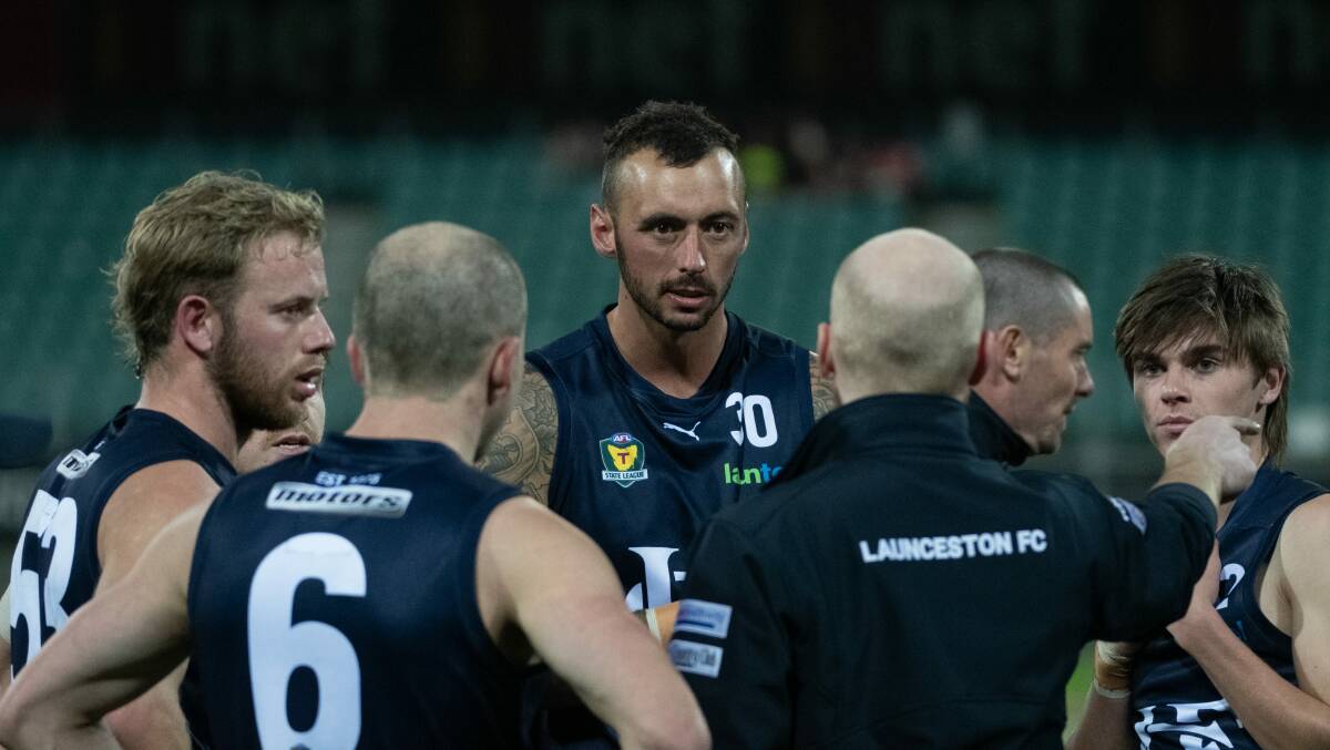 BAN WAIT: Cody Thorp (centre) will have his case heard at a tribunal next week. 