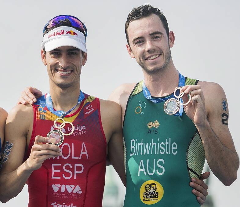FRIENDLY RIVALRY: Training partners Mario Mola and Jake Birtwhistle hold the top two spots leading into Sunday's World Triathlon Series final on the Gold Coast. Pictures: AP