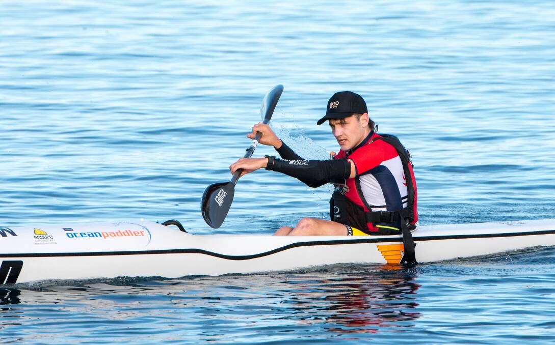 HAPPY HUNTING GROUND: Multisport athlete Alex Hunt powers ahead in the kayak leg to take out the men's open division for the third year in succession. Picture: Clive Roper