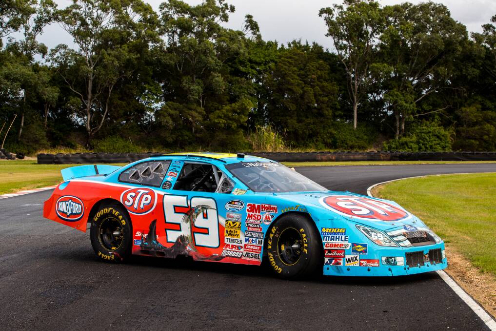 HISTORY MAKER: Marcos Ambrose's #59 STP Ford is up for sale. Picture: Supplied 