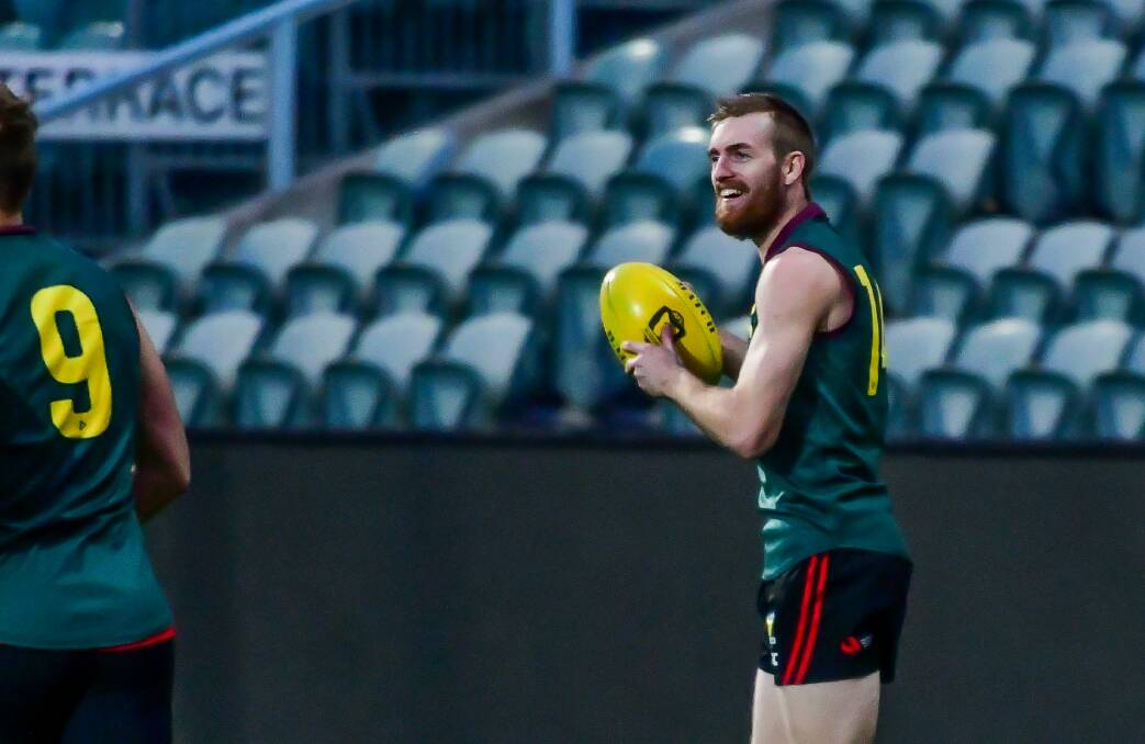 STATE DEBUT: North Launceston midfielder Josh Ponting warms up at training ahead of Sunday's clash with Victoria Metro. Picture: Scott Gelston
