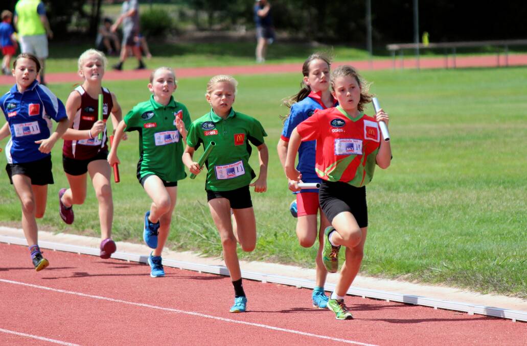PACK FORMING: Hobart Districts' Annabella Burt leads in the under-11 girls' Swedish relay. Pictures: Hamish Geale