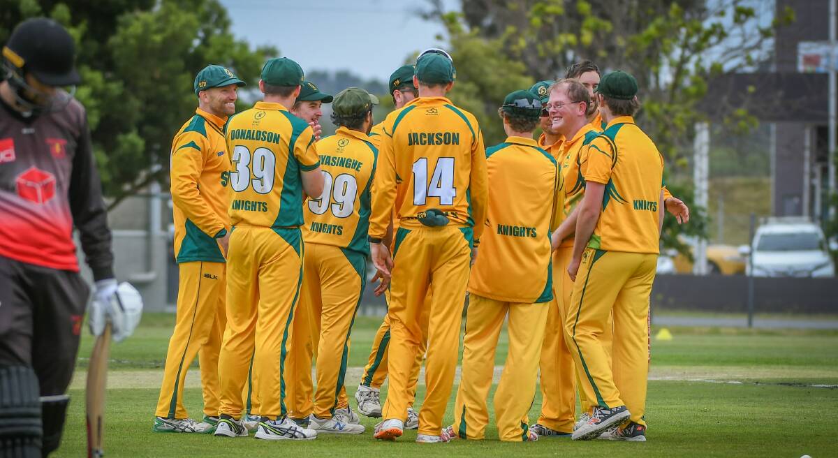 SOC IT TO 'EM: The Knights celebrate club stalwart Andrew Nichols' maiden first-grade scalp. Nichols made his A-grade debut in December after 16 years at the club, taking 1-18 off 10 and removing Ulverstone star Josh Walmsley.
