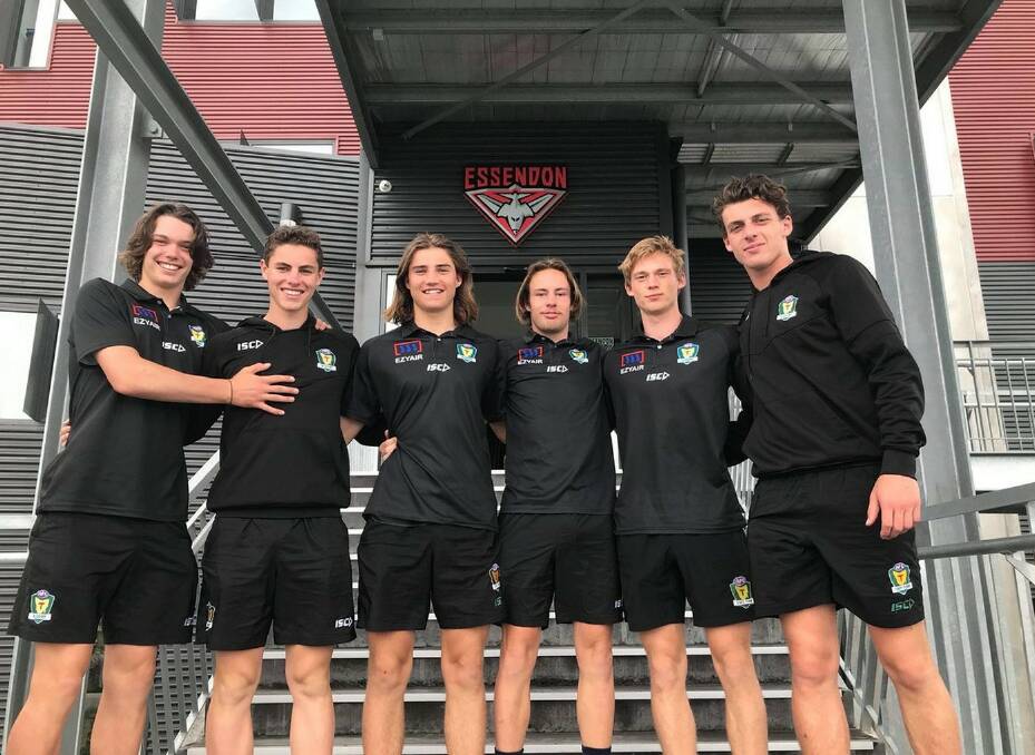 NEXT GENERATION: Young Tasmanian footballers Sam Collins, Jared Dakin, Oliver Davis, Mitch O’Neill, Will Peppin and Jackson Callow tour Essendon Football Club. Picture: Twitter